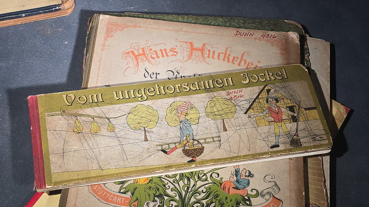 Grouping of Six Antique and Vintage German Illustrated Children's Books including "Firlefanz" ("Tomfoolery") by Hans Watzlik and Ernst Kutzer 1922, "Hans Huckebein, der Ungluecksrabe" by W. Busch, and "Die Reise in's Schlaraffenland"