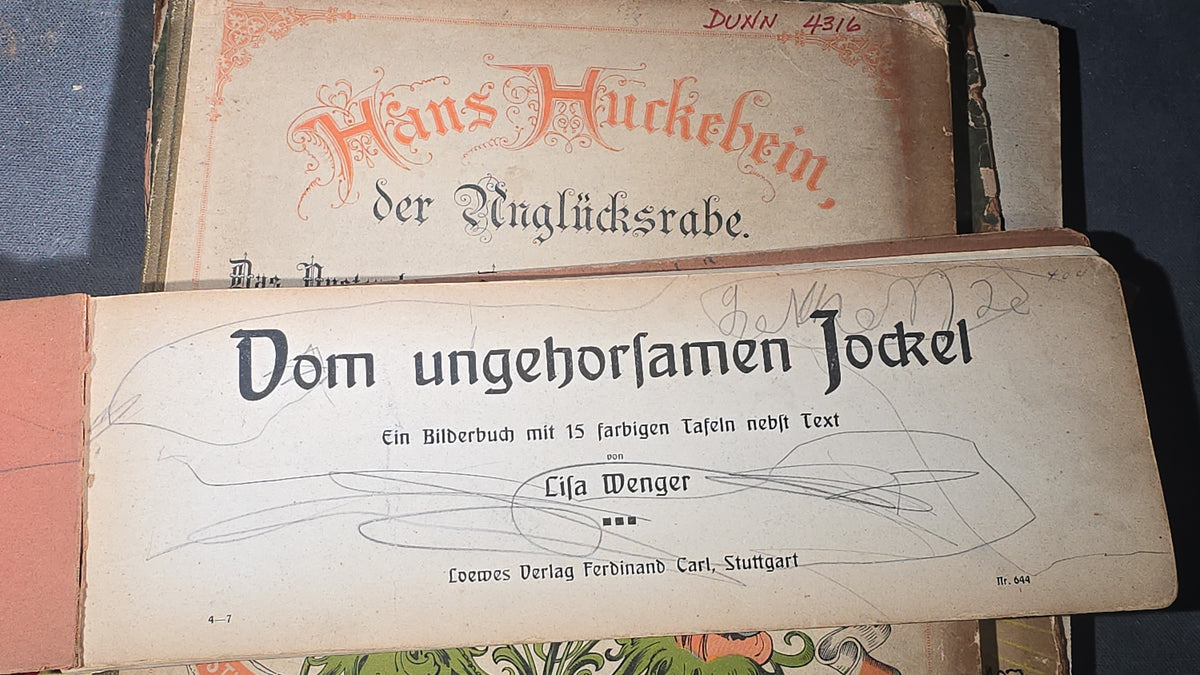 Grouping of Six Antique and Vintage German Illustrated Children's Books including "Firlefanz" ("Tomfoolery") by Hans Watzlik and Ernst Kutzer 1922, "Hans Huckebein, der Ungluecksrabe" by W. Busch, and "Die Reise in's Schlaraffenland"