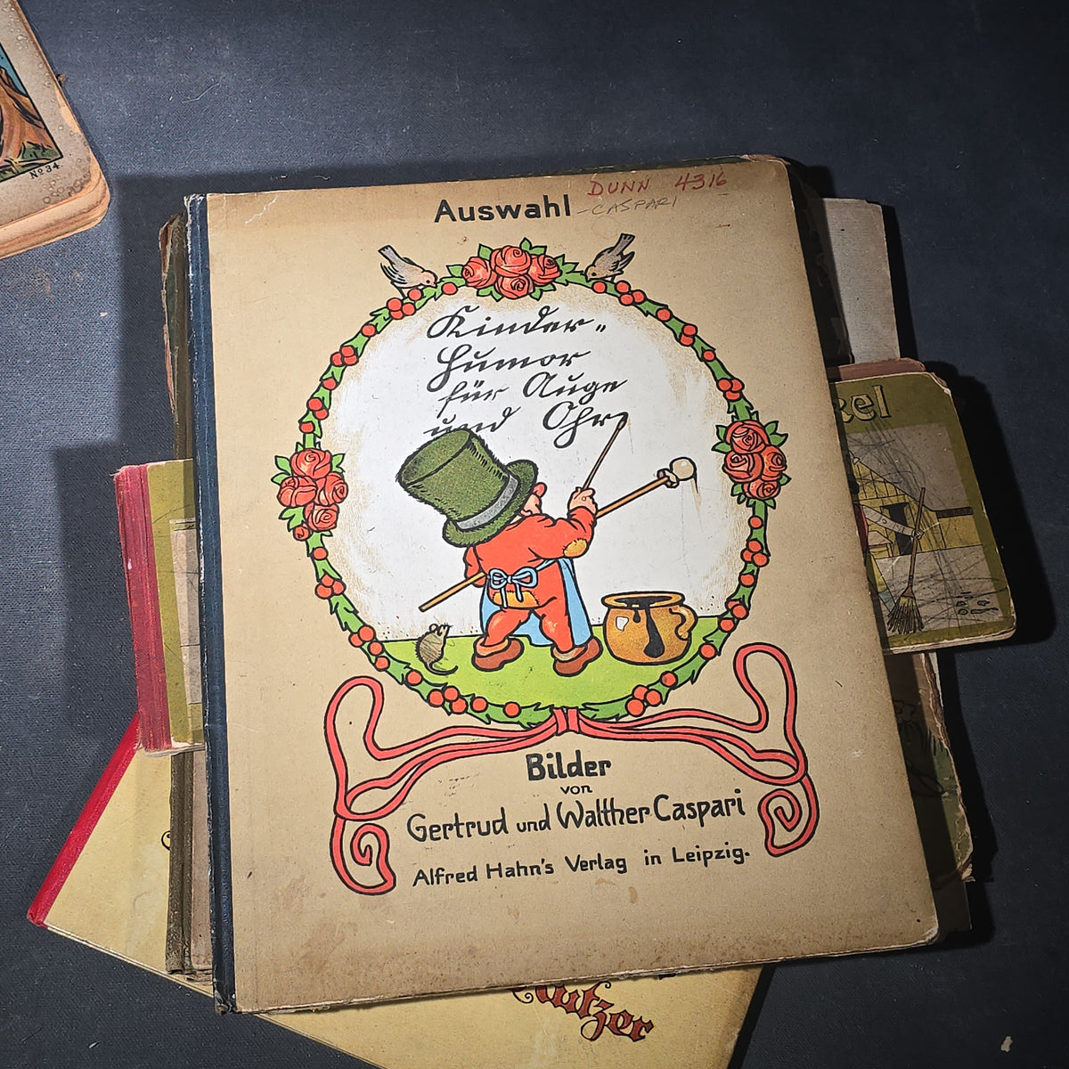 Grouping of Six Antique and Vintage German Illustrated Children's Books including "Firlefanz" ("Tomfoolery") by Hans Watzlik and Ernst Kutzer 1922, "Hans Huckebein, der Ungluecksrabe" by W. Busch, and "Die Reise in's Schlaraffenland"