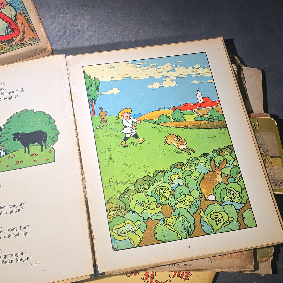 Grouping of Six Antique and Vintage German Illustrated Children's Books including "Firlefanz" ("Tomfoolery") by Hans Watzlik and Ernst Kutzer 1922, "Hans Huckebein, der Ungluecksrabe" by W. Busch, and "Die Reise in's Schlaraffenland"