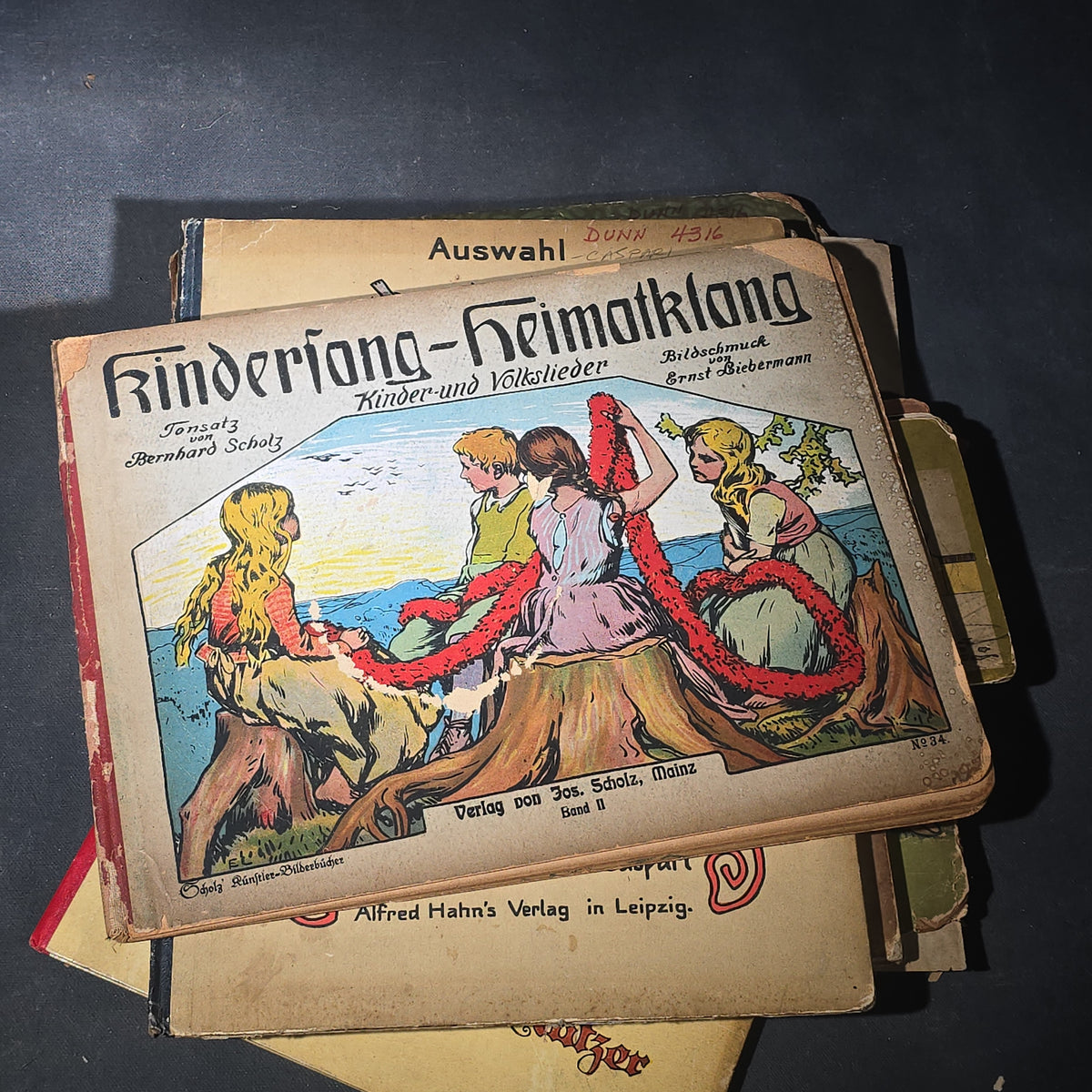 Grouping of Six Antique and Vintage German Illustrated Children's Books including "Firlefanz" ("Tomfoolery") by Hans Watzlik and Ernst Kutzer 1922, "Hans Huckebein, der Ungluecksrabe" by W. Busch, and "Die Reise in's Schlaraffenland"