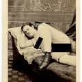 Lot 003 - Antique Carte De Visite C.D.V. Nude Photograph of a Reclining Woman on a Chaise with Lace-Edged Pillow, Stockings, and Lace-Up Boots