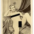 Lot 006 - Antique Carte De Visite C.D.V. Nude Photograph of a Woman Reclining on a Draped Day Bed with Floral Hair Adornment