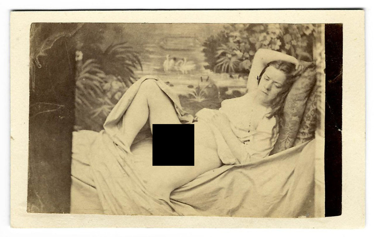 Antique Risque Carte de Visite C.D.V. Photograph of a Reclining Nude Woman on a Daybed with Painted Scenic Backdrop