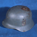 Lot 090 - Vintage WWII Era German M35 Steel Helmet with Leather Liner and Chin Strap, Numbered 153