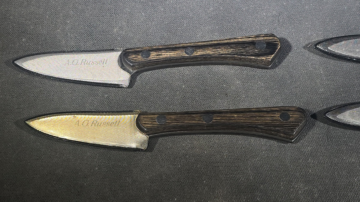 Grouping of Four Modern A.G. Russell Paring Knives with Wood Handles, Made in Japan