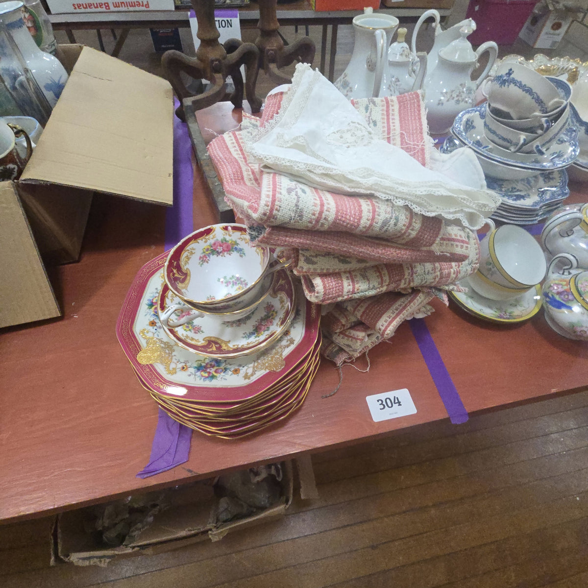 grouping of Tuscan fine English bone china, Naples pattern, and fabrics