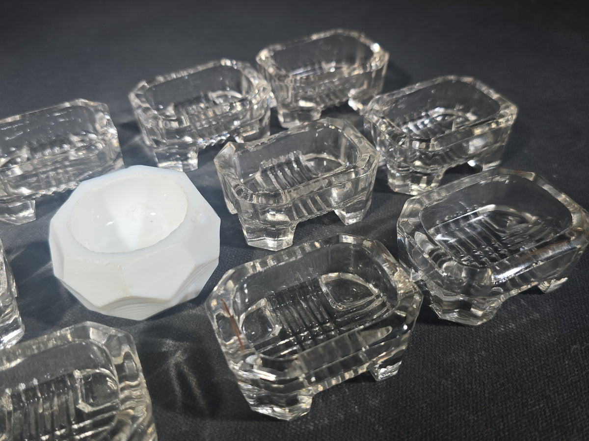 Grouping of 13 Antique Pressed Glass Open Salt Cellars including 12 Matching Uranium Glass and One White Milk Glass