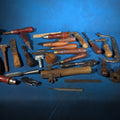 Lot 127 - Grouping of Antique and Vintage Wood-Handled Hand Tools Including Chisels, Screwdrivers, Hacksaws, Files, Wrenches, and Knives