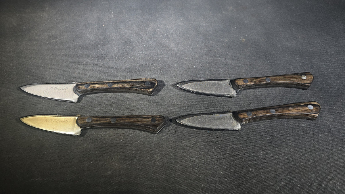 Grouping of Four Modern A.G. Russell Paring Knives with Wood Handles, Made in Japan