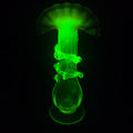 Lot 089 - Vintage Rubina Verde Uranium Glass Bud Vase with Ruffled Rim and Applied Rigaree, UV Reactive