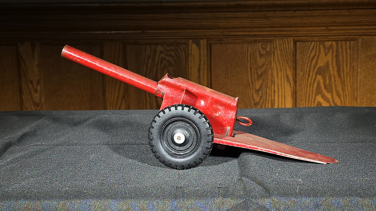 Vintage Pressed Steel Toy Artillery Cannon on Wheeled Carriage