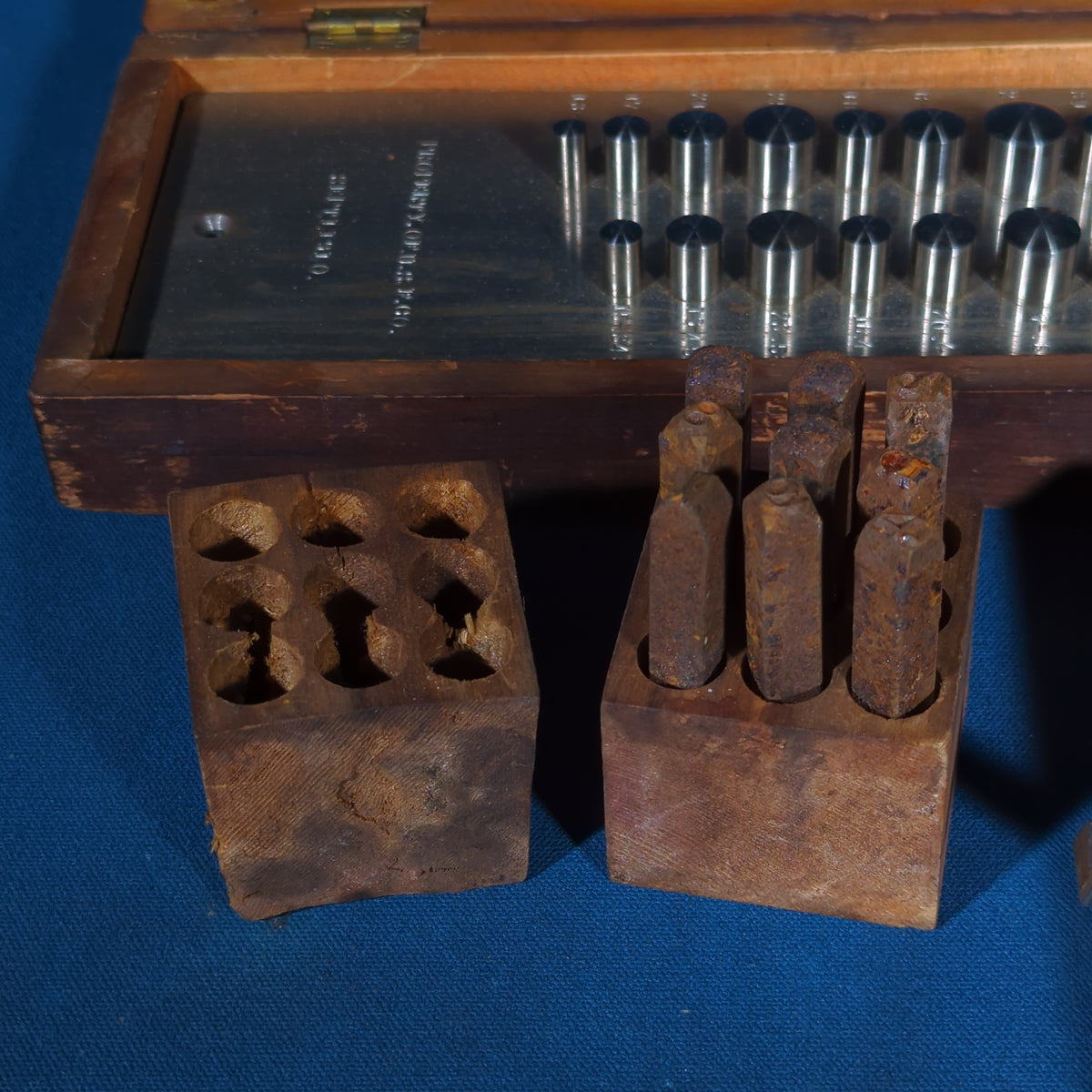 Grouping of Four Vintage and Antique Wooden-Boxed Machinist Tool Sets including Countersink Set, Taps and Dies, Number Stamps, and Alameda Gauge Co. Tool