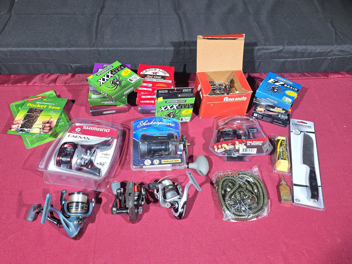 Grouping of Modern Fishing Reels, Line, and Tackle including Shimano Caenan 100, Shakespeare Tidewater, Quantum, and Penn Reels