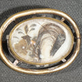 Lot 003 - Antique Victorian Hair Work Keepsake Brooch with Floral Palette Under Convex Glass in Gold-Tone Oval Setting, 1-1/8" L x 1-3/4" H