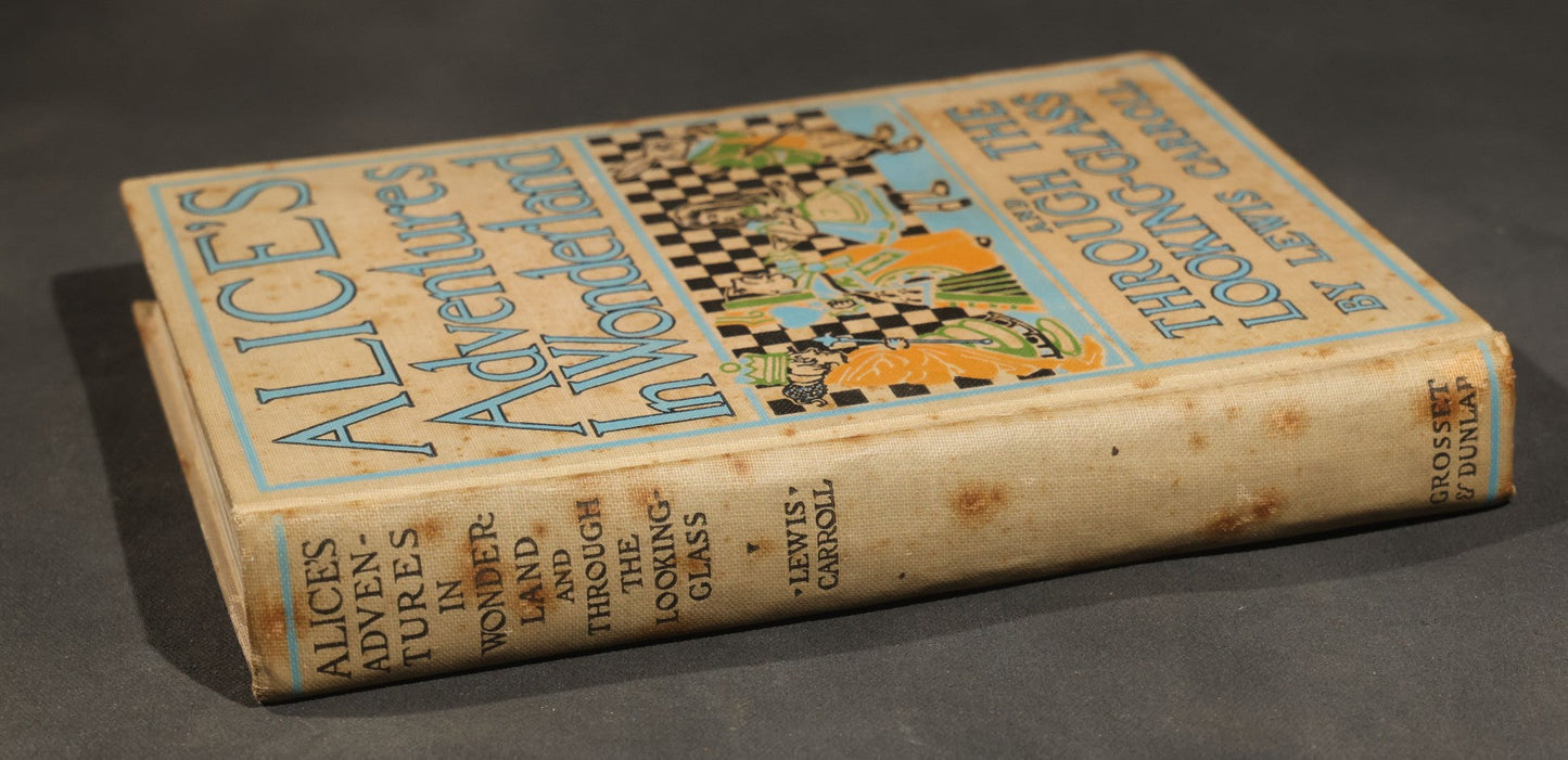 "Alice's Adventures in Wonderland and Through the Looking-Glass" Antique Photoplay Edition Book by Lewis Carroll, Illustrated with Film Stills from the Nonpareil Feature Film Corporation, Published by Grosset & Dunlap, New York, Circa 1915