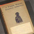 Lot 107 - "A Turkish Woman's European Impressions" Antique Book by Zeyneb Hanoum, Edited by Grace Ellison, with 23 Illustrations and a Drawing by Auguste Rodin, Published by Seeley, Service & Co. Ltd., London, 1913, in Dust Jacket