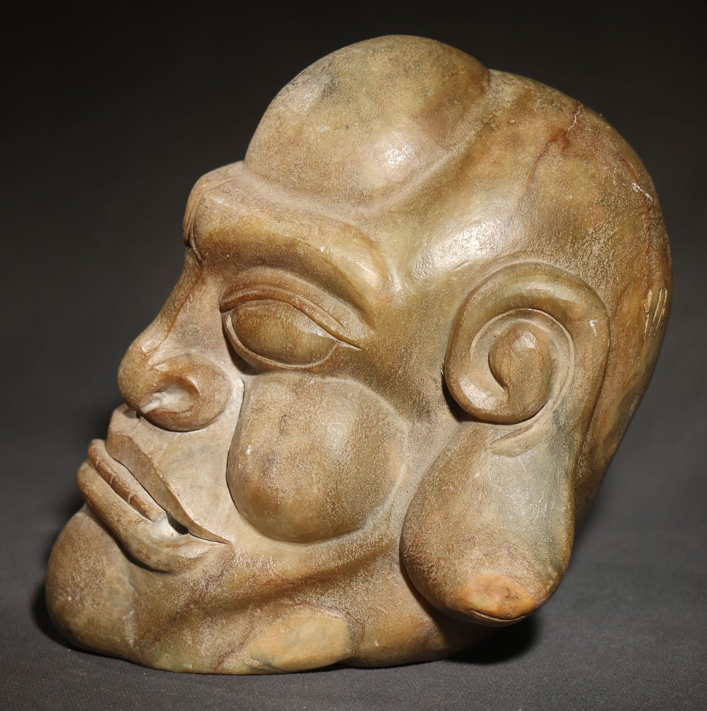Vintage Carved Stone Grotesque Head with Exaggerated Features and Spiral Ears