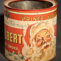 Lot 087 - Vintage Prince Albert "the National Joy Smoke" Christmas Tobacco Tin with Santa Claus, Snowy Village, Holly, and "Season's Greetings" Gift Tag, Paper Label Over Tin, no Lid, 5-3/8" H