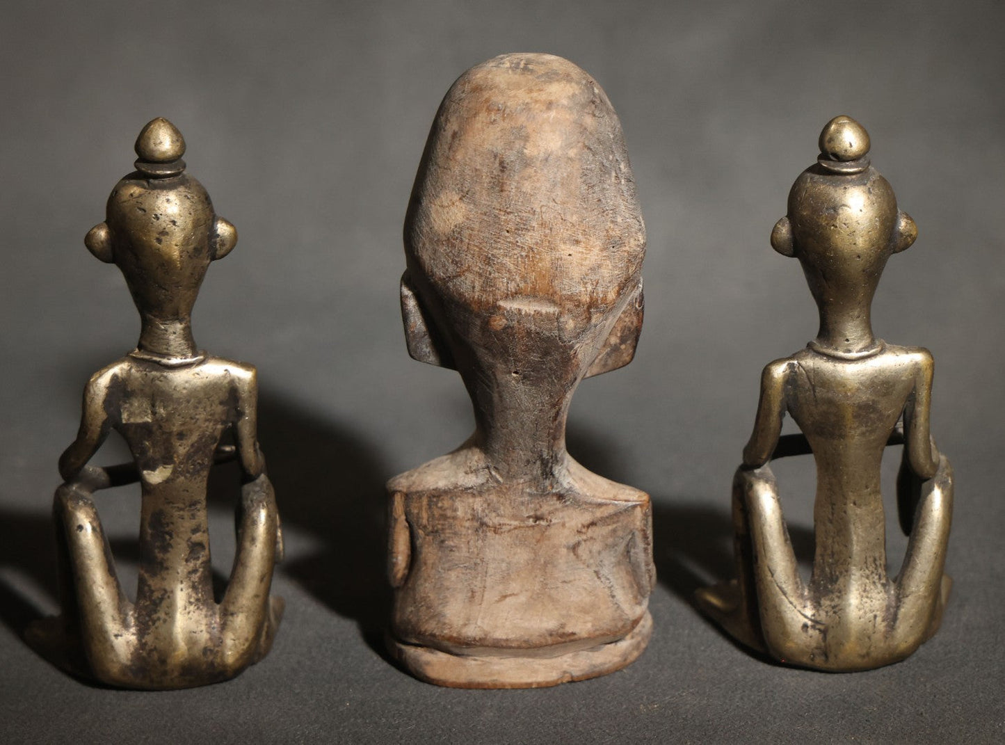 Trio of Vintage African-Style Metal and Wood Figures Including Two Seated Metal Figures and One Carved Wood Bust