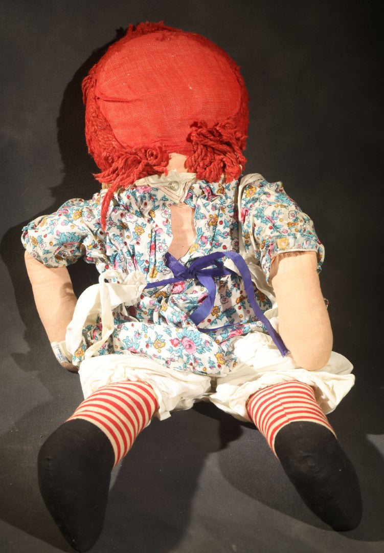 Grouping of Five Vintage Raggedy Ann and Andy Items Including Two Cloth Dolls, 24" L Each, and Three 1970s Plastic Wall Hangings by Dart Industries, Bobbs-Merrill Company Copyright