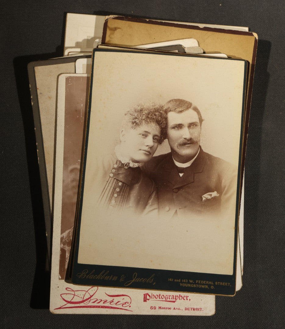 Grouping of 30+ Antique Cabinet Card Photographs of Men, Women, Children, and Families Including Photographers from Oberlin, Ohio, Youngstown, Ohio, West Lafayette, Indiana, Kalamazoo, Michigan, and Detroit, Michigan