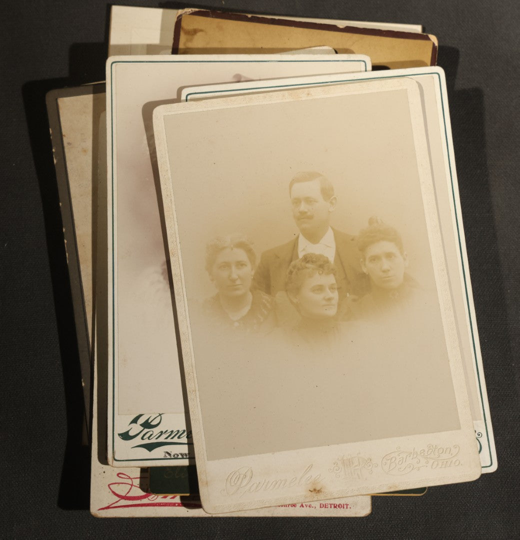 Grouping of 30+ Antique Cabinet Card Photographs of Men, Women, Children, and Families Including Photographers from Oberlin, Ohio, Youngstown, Ohio, West Lafayette, Indiana, Kalamazoo, Michigan, and Detroit, Michigan