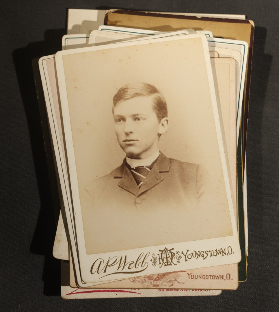 Grouping of 30+ Antique Cabinet Card Photographs of Men, Women, Children, and Families Including Photographers from Oberlin, Ohio, Youngstown, Ohio, West Lafayette, Indiana, Kalamazoo, Michigan, and Detroit, Michigan