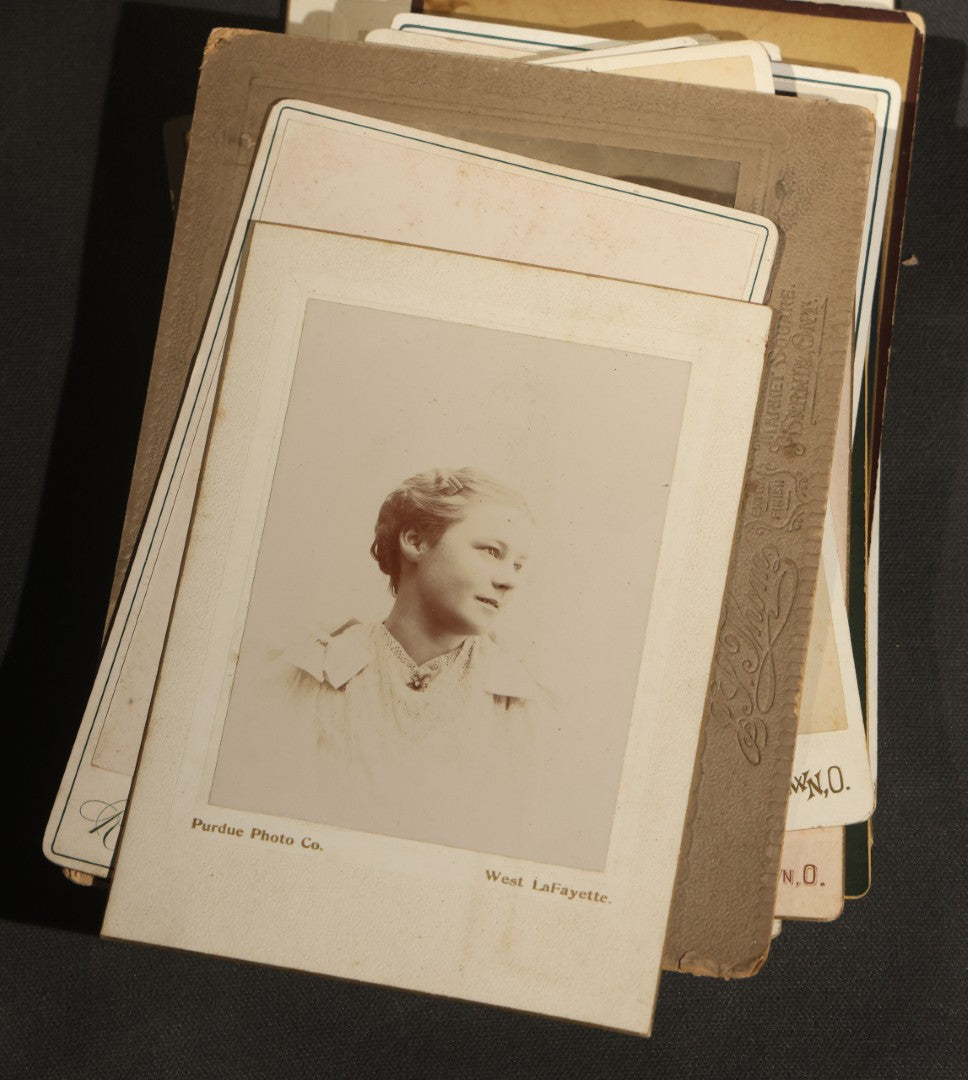 Grouping of 30+ Antique Cabinet Card Photographs of Men, Women, Children, and Families Including Photographers from Oberlin, Ohio, Youngstown, Ohio, West Lafayette, Indiana, Kalamazoo, Michigan, and Detroit, Michigan