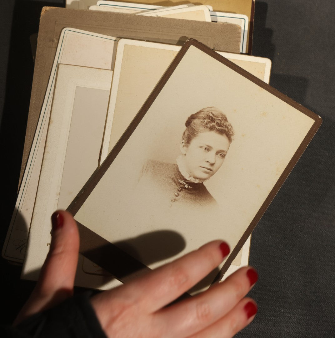 Grouping of 30+ Antique Cabinet Card Photographs of Men, Women, Children, and Families Including Photographers from Oberlin, Ohio, Youngstown, Ohio, West Lafayette, Indiana, Kalamazoo, Michigan, and Detroit, Michigan