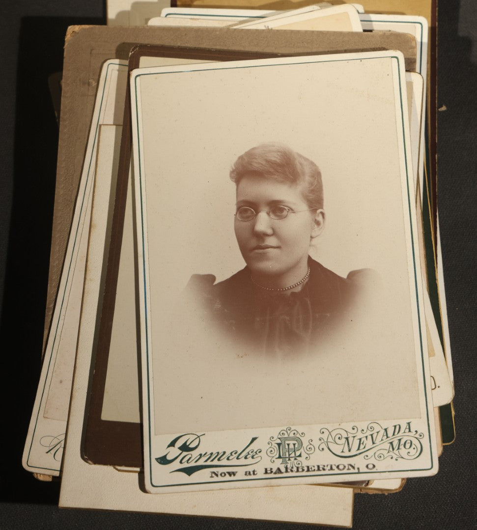 Grouping of 30+ Antique Cabinet Card Photographs of Men, Women, Children, and Families Including Photographers from Oberlin, Ohio, Youngstown, Ohio, West Lafayette, Indiana, Kalamazoo, Michigan, and Detroit, Michigan