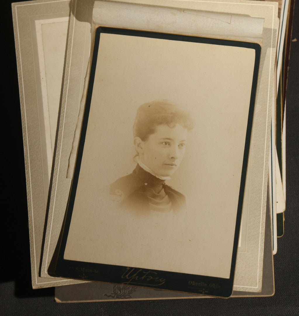 Grouping of 30+ Antique Cabinet Card Photographs of Men, Women, Children, and Families Including Photographers from Oberlin, Ohio, Youngstown, Ohio, West Lafayette, Indiana, Kalamazoo, Michigan, and Detroit, Michigan