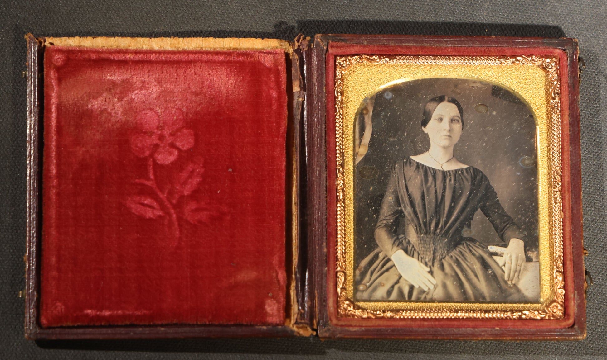 Antique 1/6th Plate Daguerreotype Photograph of a Young Woman in a Dark Dress Holding a Book, Full Intact Leatherette Case with Wear
