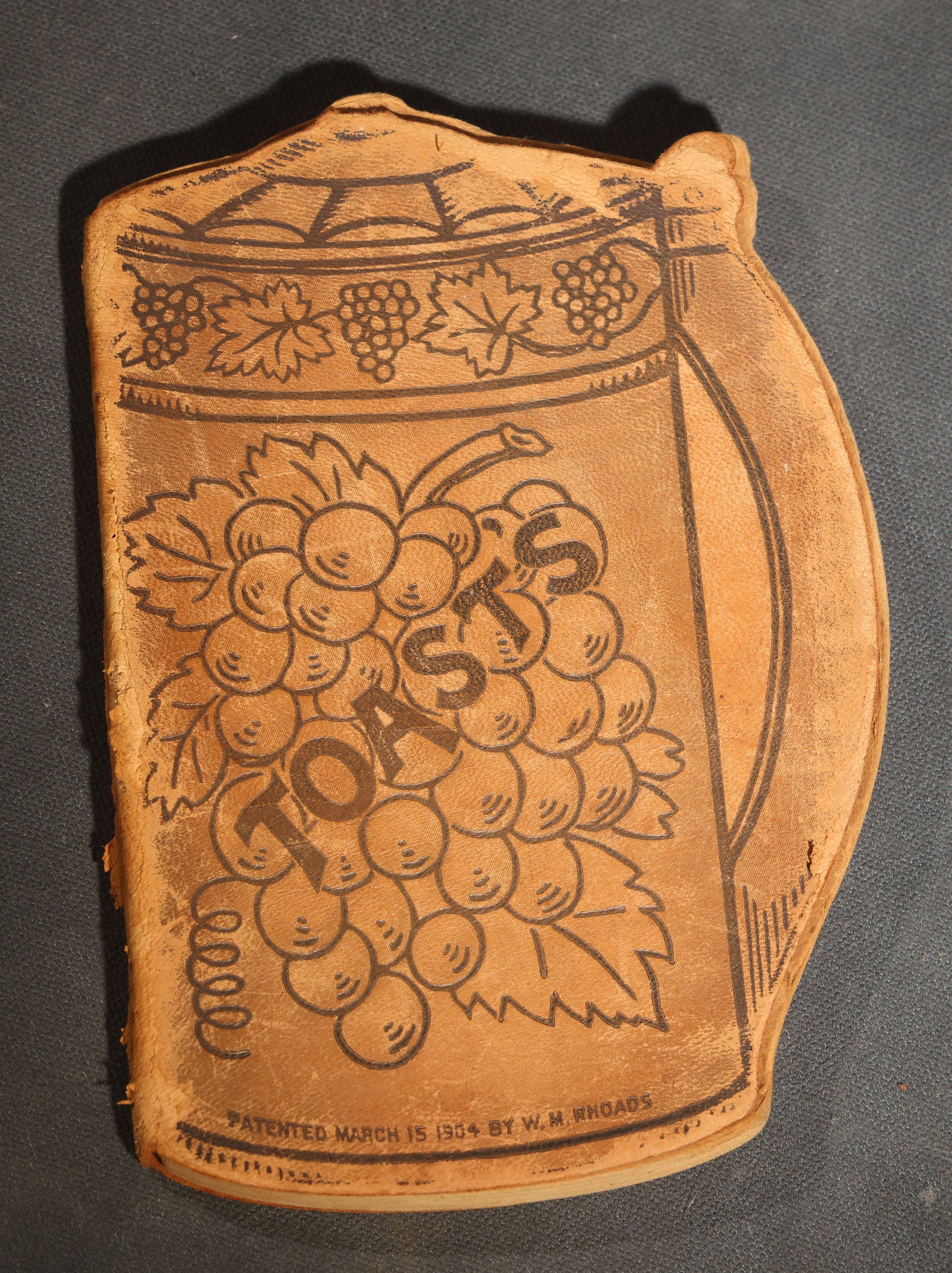 "Toasts" Antique Leather-Covered Stein-Shaped Novelty Book Compiled by W.M. Rhoads, Drawings by Clare Victor Dwiggins, Published by the Penn Publishing Company, Philadelphia, Pennsylvania, 1904