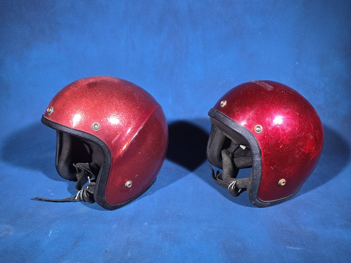 Pair of Vintage Red Metal Flake Open-Face Motorcycle Helmets