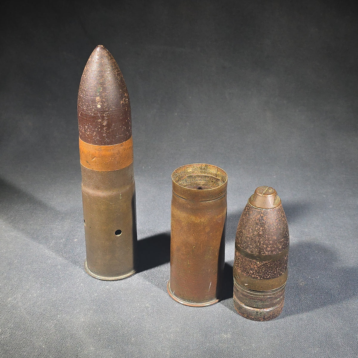Pair of Antique Inert 37mm Artillery Shell Rounds, One Stamped "37mm Gun Model of 1916" with Lot Number