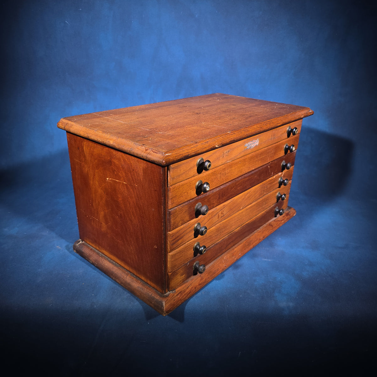 Antique Six-Drawer Oak Spool Cabinet, Manufactured by Jessen & Rosberg, Chicago, Illinois