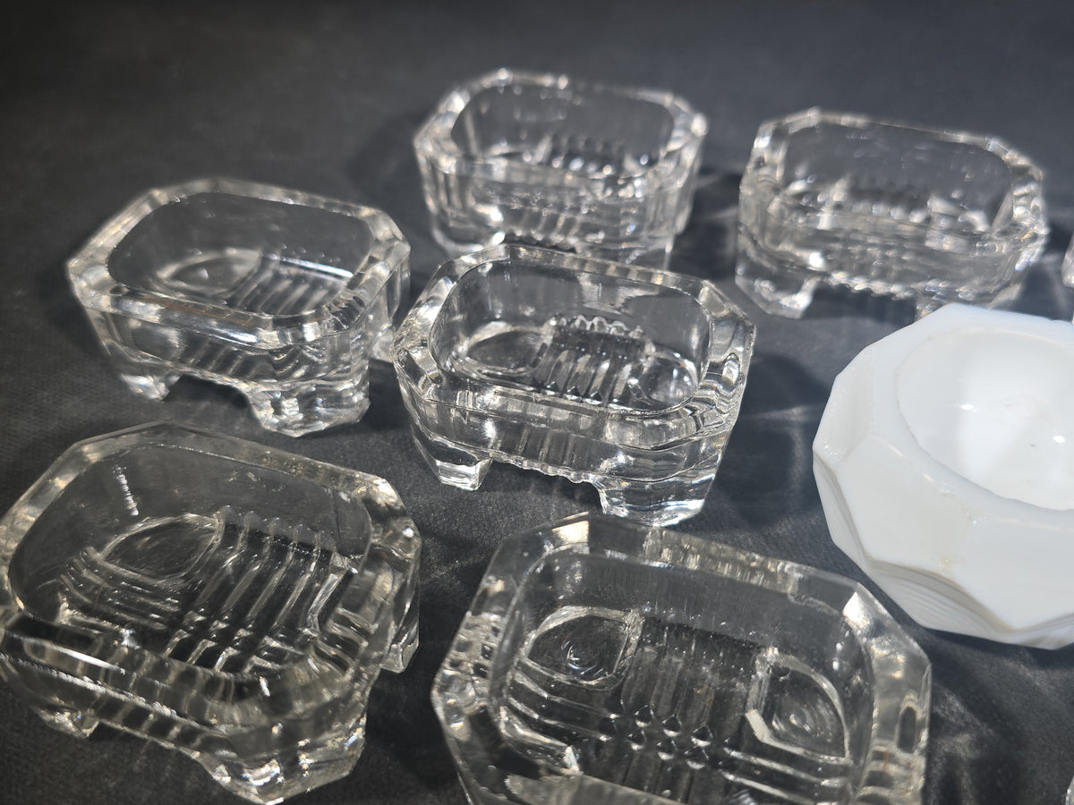 Grouping of 13 Antique Pressed Glass Open Salt Cellars including 12 Matching Uranium Glass and One White Milk Glass