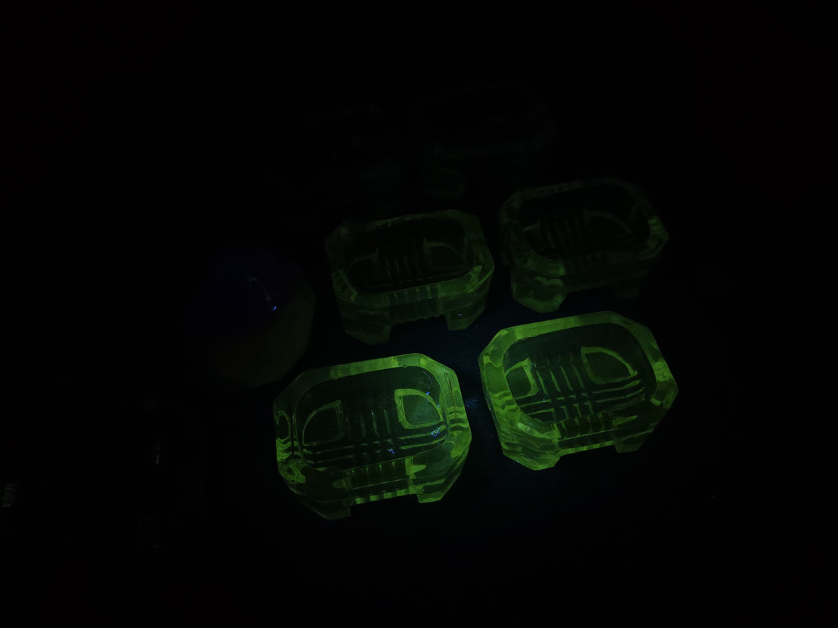 Grouping of 13 Antique Pressed Glass Open Salt Cellars including 12 Matching Uranium Glass and One White Milk Glass