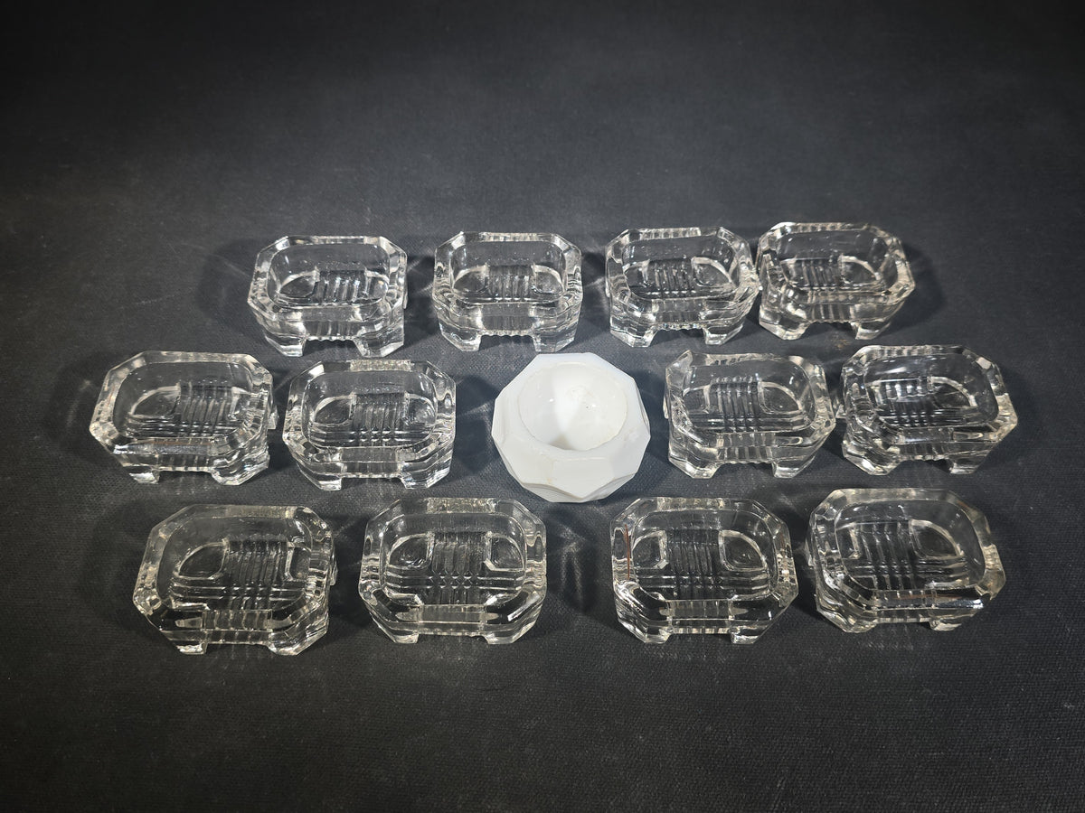 Grouping of 13 Antique Pressed Glass Open Salt Cellars including 12 Matching Uranium Glass and One White Milk Glass