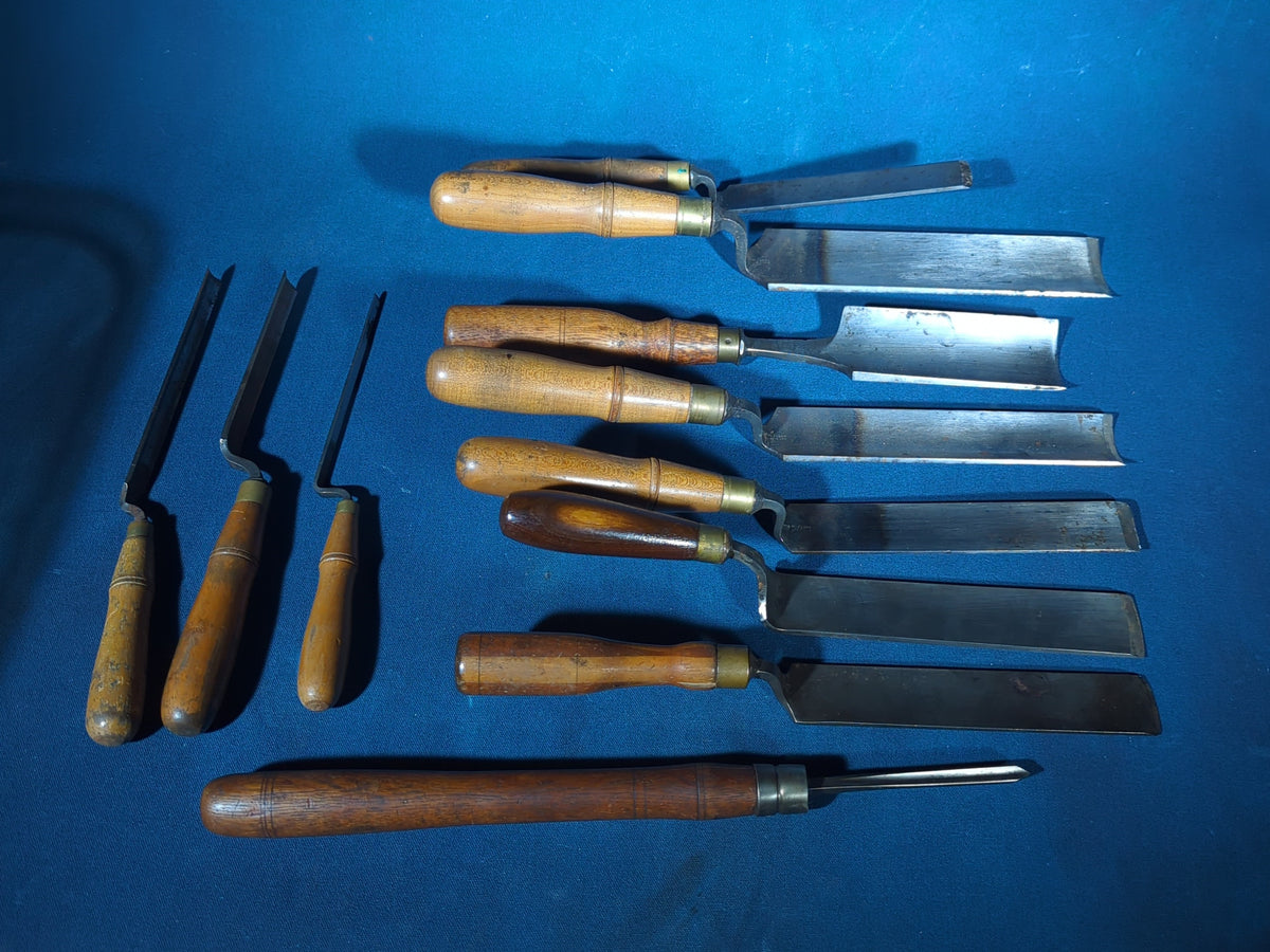 Grouping of 11 Antique Wood Chisels and Gouges with Wood Handles including Buck Brothers Cast Steel and Moulson Brothers Sheffield