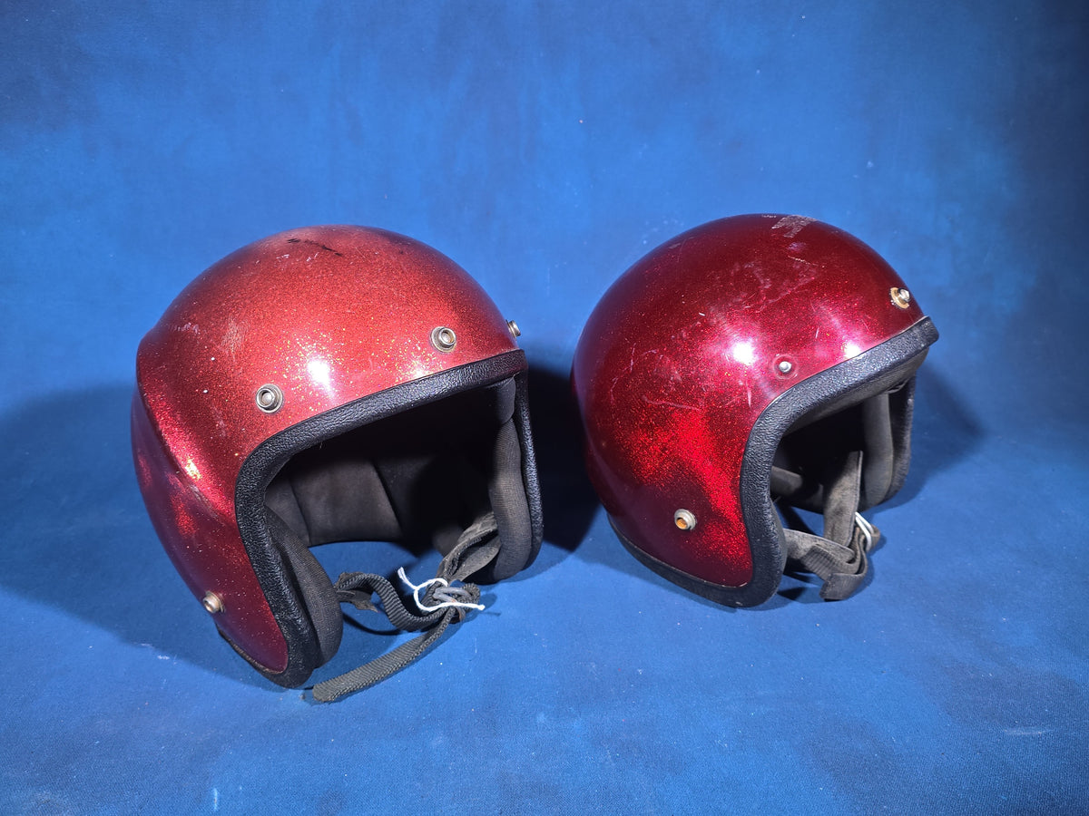 Pair of Vintage Red Metal Flake Open-Face Motorcycle Helmets