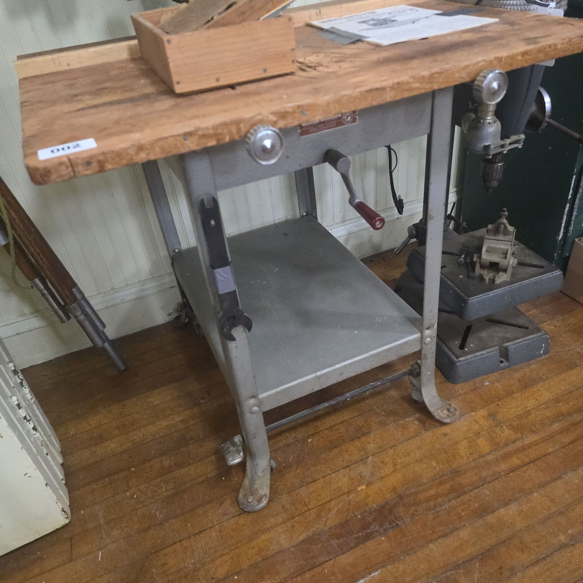 vintage Rockwell Delta 130 amp super 990 radial saw, on table base
