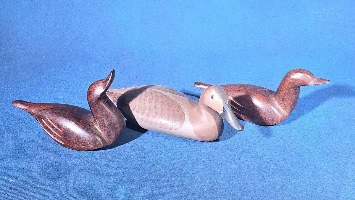 Trio of Vintage Carved Wood Duck Figures including One Painted and Signed Capt. Harry Jobes