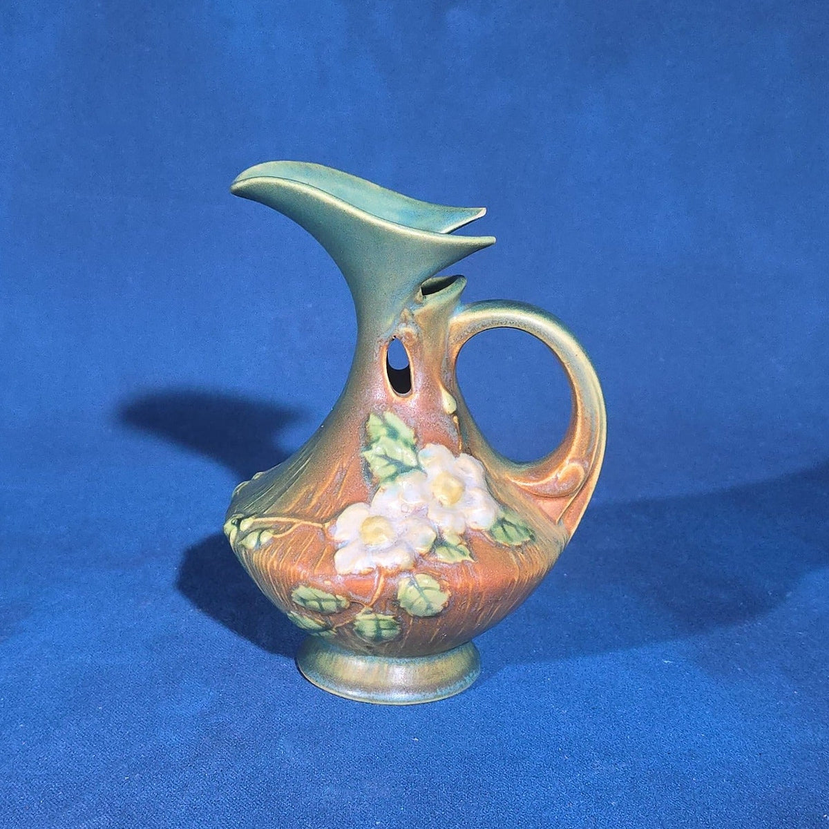 Trio of Vintage Roseville Pottery Pieces including Foxglove Vase 44-6", White Rose Ewer 981-6", and White Rose Vase 146-6", Chips to All Three