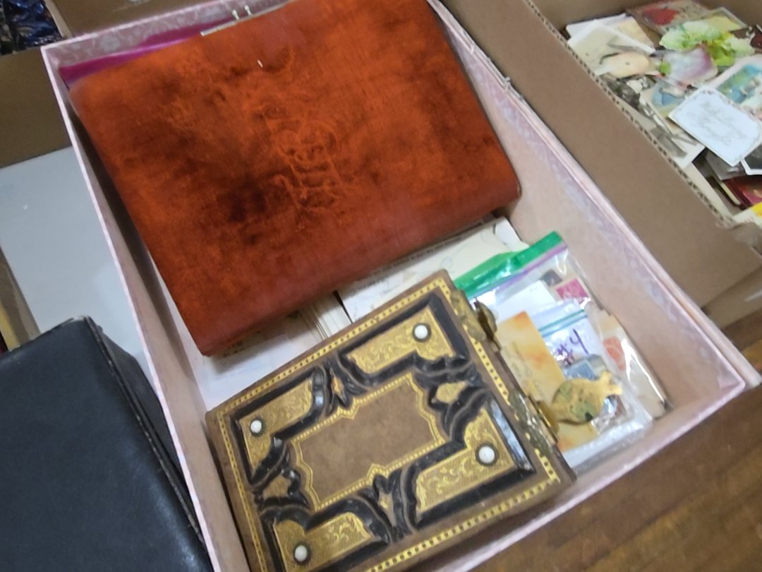box lot of ephemera and photography including stamps and photo albums