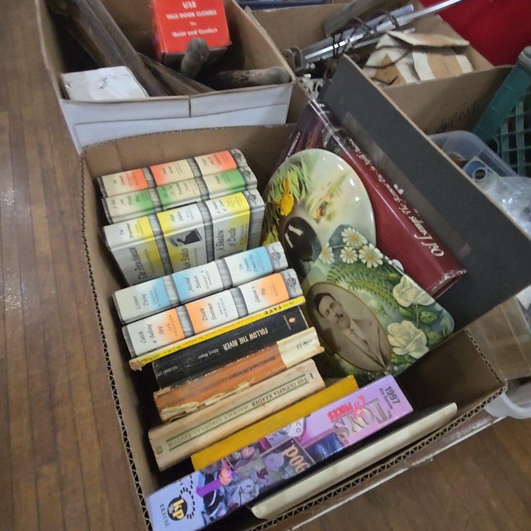 box lot with books and photo buttons