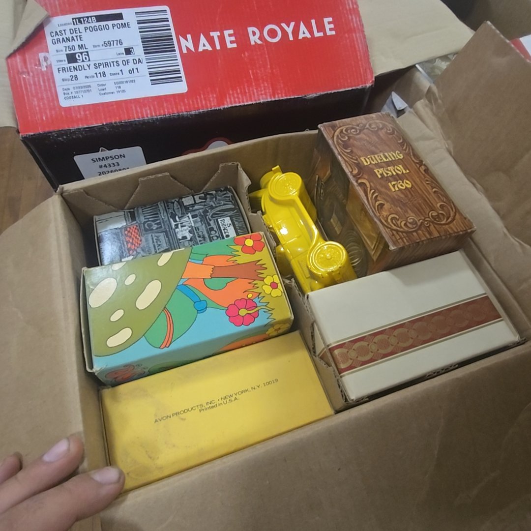 box lot of Avon bottles