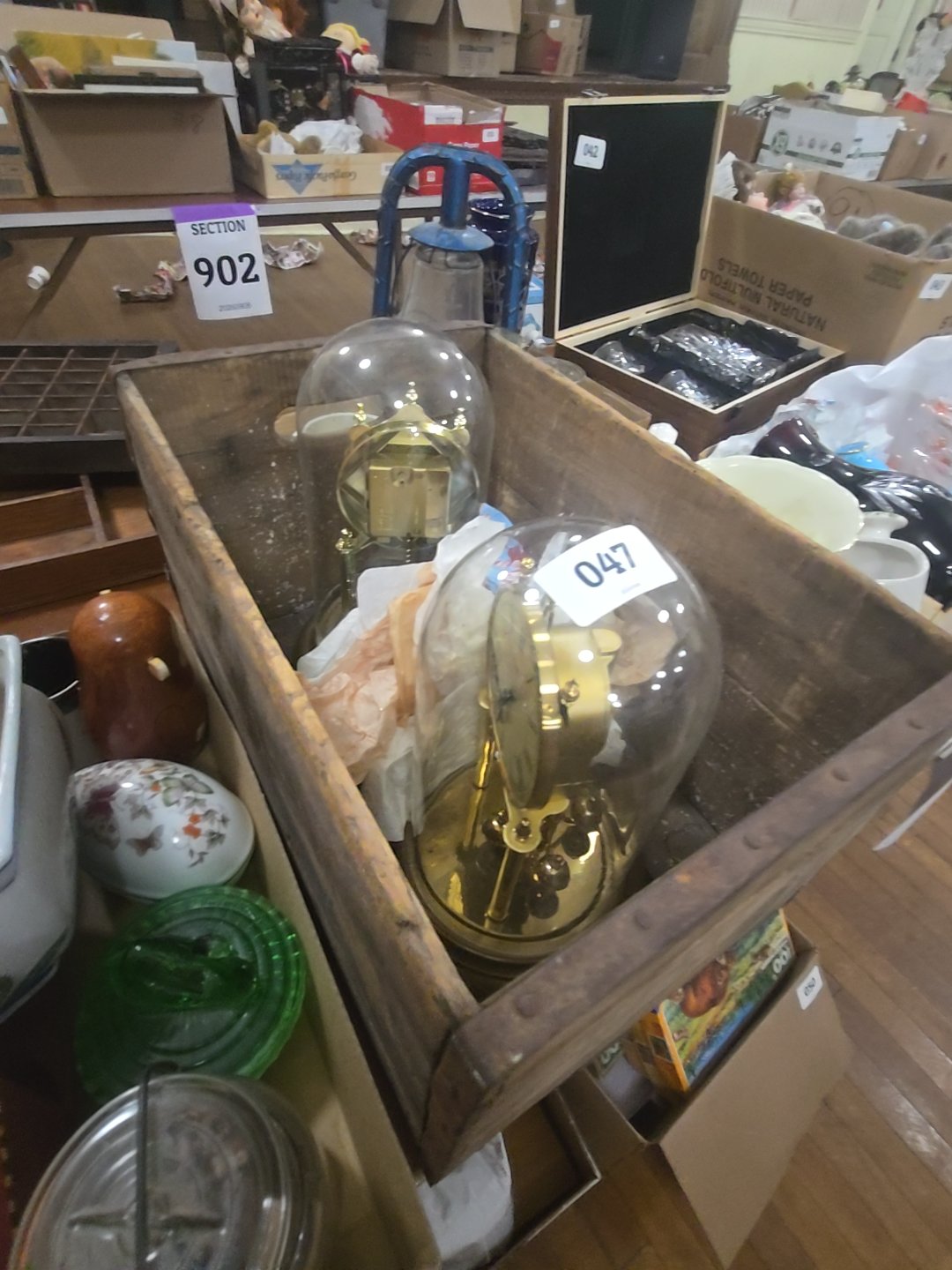 wooden crate with two anniversary clocks