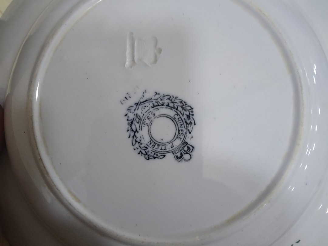 grouping of five antique china pattern plates